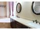 Bathroom featuring double sink vanity and soaking tub at 13487 E Gold Dust Ave, Scottsdale, AZ 85259