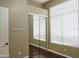 Neutral bedroom with a mirrored closet and a bright window at 13487 E Gold Dust Ave, Scottsdale, AZ 85259