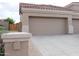 Attached three-car garage and spacious driveway at 13487 E Gold Dust Ave, Scottsdale, AZ 85259