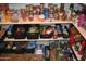 Organized pantry shelves filled with an assortment of canned goods and household items at 1353 S Western Skies Dr, Gilbert, AZ 85296