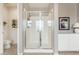 Bathroom featuring a glass enclosed shower, toilet, and neutral walls at 1548 W Windhaven Ave, Gilbert, AZ 85233