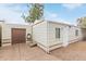 Shot of the mobile home and detached garage on a cloudy day at 17200 W Bell Rd # 2125, Surprise, AZ 85374