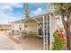 Cozy patio with wrought iron decor, furniture, and a grill at 17200 W Bell Rd # 2125, Surprise, AZ 85374