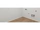 Practical laundry area with tile floor and utility hookups, ready for appliances at 18345 W Gray Fox Trl, Wittmann, AZ 85361