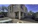 Townhome back patio with outdoor seating, stone pavers, and gravel landscaping at 1943 E Hayden Ln # 103, Tempe, AZ 85281