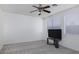 Bright bedroom with neutral carpet, white walls, and two large windows at 1943 E Hayden Ln # 103, Tempe, AZ 85281