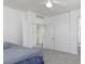 Spacious bedroom featuring plush carpet, white walls, and a walk-in closet at 1943 E Hayden Ln # 103, Tempe, AZ 85281