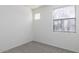 Bedroom featuring neutral carpet and bright natural light at 1943 E Hayden Ln # 103, Tempe, AZ 85281