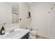 Bright bathroom featuring a vanity sink with neutral color scheme and coordinated fixtures at 1978 E Connemara Dr, San Tan Valley, AZ 85140