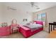 Bedroom with a twin-sized bed, natural light, and neutral decor at 1978 E Connemara Dr, San Tan Valley, AZ 85140