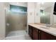 Bathroom featuring a walk-in shower and a single sink vanity with granite counters at 21854 N 263Rd Dr, Buckeye, AZ 85396