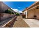 The backyard has low maintenance desert landscaping and a covered patio at 219 E Valley View Dr, Phoenix, AZ 85042