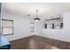 Open concept dining space with modern light fixtures and flooring at 219 E Valley View Dr, Phoenix, AZ 85042