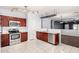 Modern kitchen featuring stainless steel appliances and modern light fixtures at 219 E Valley View Dr, Phoenix, AZ 85042