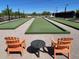 Bocce ball court with Adirondack chairs and a table at 24275 N 173Rd Ave, Surprise, AZ 85387