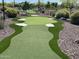 Community putting green featuring artificial turf, sand traps, and landscaping at 24275 N 173Rd Ave, Surprise, AZ 85387