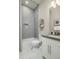 Bathroom featuring a shower over the tub, stylish gray tiling and a modern vanity at 24283 S 219Th Way, Queen Creek, AZ 85142