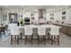 Kitchen with modern cabinetry, a large island with counter seating, and pendant lighting at 24283 S 219Th Way, Queen Creek, AZ 85142