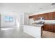 Bright kitchen boasts granite countertops, stainless steel appliances, and plenty of counter space at 25286 N 156Th Ln, Surprise, AZ 85387