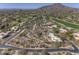 Beautiful aerial shot of an estate home featuring a pool, a desert landscape, and picturesque mountain views at 3119 Arroyo Hondo --, Carefree, AZ 85377