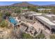 Aerial view of an estate with pool, patio, and built in BBQ overlooking gorgeous desert landscaping at 3119 Arroyo Hondo --, Carefree, AZ 85377