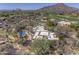 Beautiful aerial shot of an estate home featuring a pool, a desert landscape, and picturesque mountain views at 3119 Arroyo Hondo --, Carefree, AZ 85377