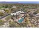 Expansive aerial view of estate showcasing a beautiful pool, manicured landscaping, and desert views at 3119 Arroyo Hondo --, Carefree, AZ 85377