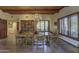 Bright dining room showcasing wood ceiling, a chandelier, and shuttered windows at 3119 Arroyo Hondo --, Carefree, AZ 85377