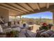 Covered patio offering comfortable seating and stunning desert views, perfect for outdoor relaxation and entertaining at 3119 Arroyo Hondo --, Carefree, AZ 85377