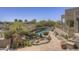 A refreshing pool with rock features and desert plants creates a backyard oasis for relaxation and enjoyment at 3119 Arroyo Hondo --, Carefree, AZ 85377