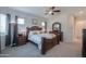 Bedroom featuring a bed, ceiling fan, neutral walls, and plush carpet at 391 N San Ricardo Trl, Casa Grande, AZ 85194