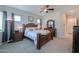 Bedroom featuring a bed, ceiling fan, neutral walls, and plush carpet at 391 N San Ricardo Trl, Casa Grande, AZ 85194