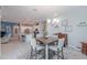 Cozy dining room with pendant lighting adjacent to the kitchen and living area at 391 N San Ricardo Trl, Casa Grande, AZ 85194