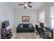 Office featuring a black sofa and desk at 391 N San Ricardo Trl, Casa Grande, AZ 85194