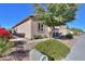 Well-maintained side yard with desert landscaping and a view of the home's exterior at 391 N San Ricardo Trl, Casa Grande, AZ 85194