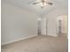 Spacious bedroom with neutral carpet and access to closet and en suite bathroom at 4053 W Quail Ave, Glendale, AZ 85308