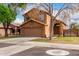 Inviting two-story home featuring a tidy lawn and a convenient two-car garage at 4053 W Quail Ave, Glendale, AZ 85308