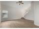 Bright living room boasting sleek floors, high ceilings and abundant natural light at 4053 W Quail Ave, Glendale, AZ 85308