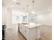 Kitchen with island features stainless steel appliances and an eat in kitchen area at 41740 W Sonoran Trl, Maricopa, AZ 85138