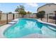 Fenced pool with concrete deck and steps offers a private space for relaxation and recreation at 4360 E Sierrita Rd, San Tan Valley, AZ 85143