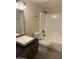 Updated bathroom offers modern vanity with vessel sink and bathtub at 607 W 14Th St, Tempe, AZ 85281