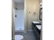 Renovated bathroom features double sinks, black hardware and step-in shower at 607 W 14Th St, Tempe, AZ 85281