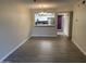 Dining area with adjacent pass through to modern kitchen and a view of the front entry at 607 W 14Th St, Tempe, AZ 85281