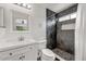 Modern bathroom featuring a sleek vanity and stylish walk-in shower with contemporary tiling at 630 E Jensen St # 162, Mesa, AZ 85203