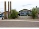 Street view of home with lush landscaping and mature trees at 6847 S Willow Dr, Tempe, AZ 85283