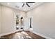 Bedroom featuring hard wood floors and a ceiling fan at 7309 E Rovey Ave, Scottsdale, AZ 85250