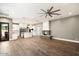 Spacious living room showcases a fireplace and flows into the gourmet kitchen at 7309 E Rovey Ave, Scottsdale, AZ 85250