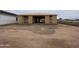 Nearly completed home framing of a house under construction with bare dirt in the front at 9548 W Parkway Dr, Tolleson, AZ 85353