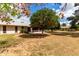 The house features orange trees in the backyard at 9625 W Oak Ridge Dr, Sun City, AZ 85351