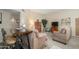 Cozy living room featuring comfortable seating, soft lighting, and neutral decor at 10443 W Loma Blanca Dr, Sun City, AZ 85351